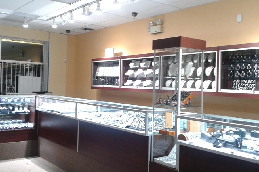 Wall cases of necklaces and pendants above the main counter