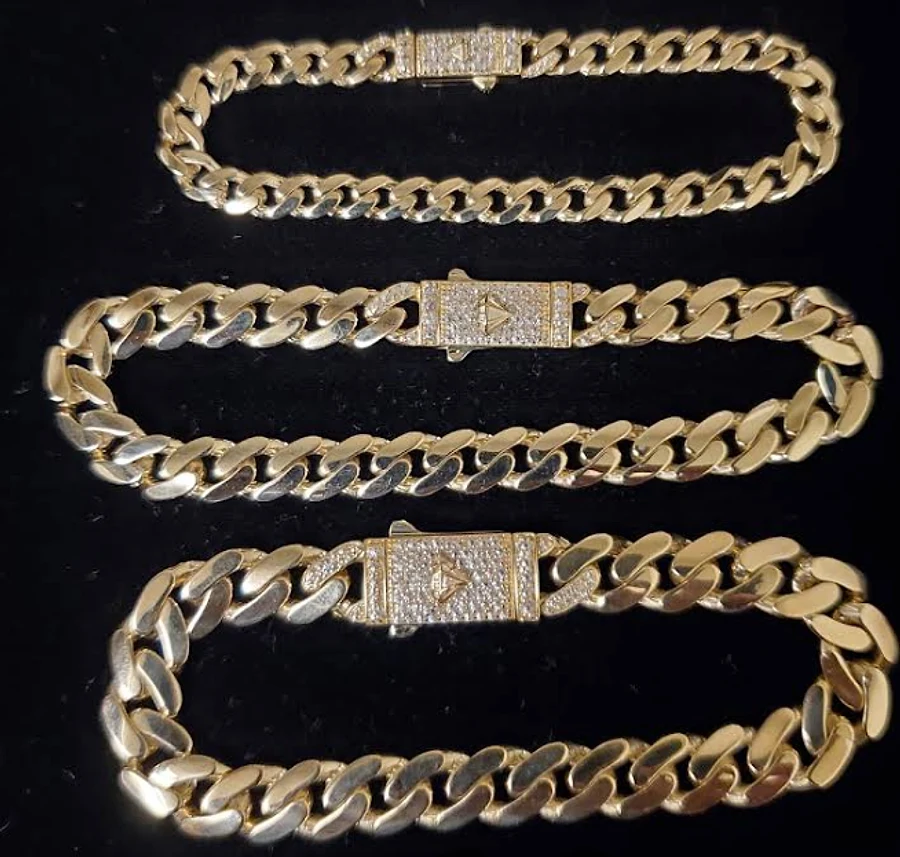 Three gold Miami Cuban bracelets with iced box clasps